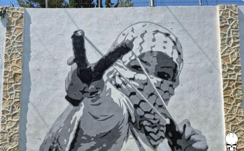 Green Brigade pro-Palestina grafit v begunskem taborišču Aida Celtic